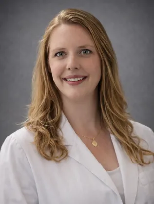 Professional portrait of Tara Barto, MD, featured Conzultos expert